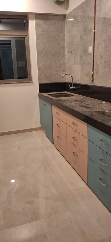 Kitchen in 2 BHK Apartment at Sheth Irene, Malad West – for Rent