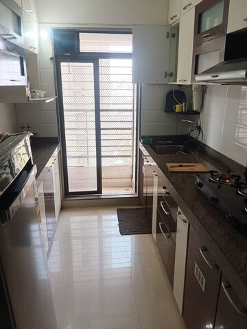 Kitchen in 1 BHK Apartment at Abhay Sheetal  Complex, Mira Road – for Sale