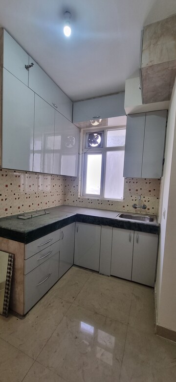 Kitchen in 1 RK Apartment at Mahindra Aura, Sector 110a – for Rent