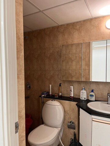 Bathroom in 1 BHK Apartment at Brigade Bricklane, Jakkuru – for Sale