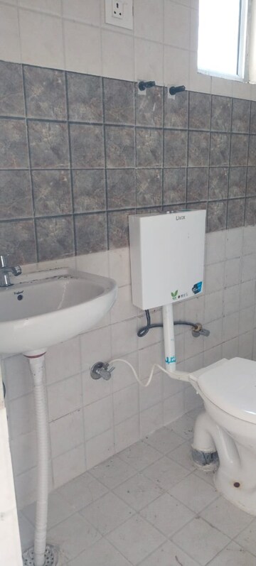 Bathroom in 2 BHK Apartment at Shree Vardhman Green Court, Sector 90 – for Rent