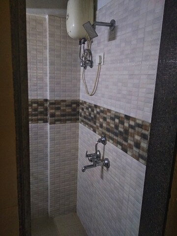 Bathroom in 2 BHK Apartment at Galaxy Heights, Goregaon West – for Rent