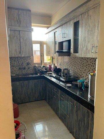 Kitchen in 2 BHK Apartment at Proview Officer City 2, Raj Nagar Extension – for Rent
