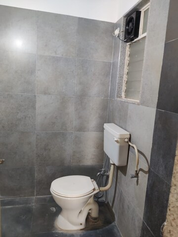 Bathroom in 1.5 BHK Apartment at Palladium Homes, Dhanori – for Sale