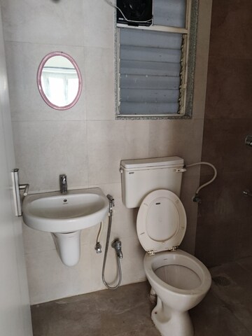 Bathroom in 1.5 BHK Apartment at Palladium Homes, Dhanori – for Sale