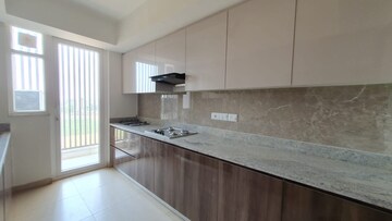 Kitchen in 4 BHK Builder Floor at DLF Garden City Independent Floors, Sector 92 – for Rent