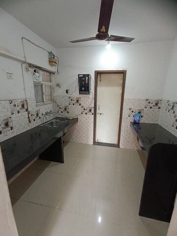 Kitchen in 3 BHK Apartment at Runwal Seagull, Udhyog Nagar – for Rent