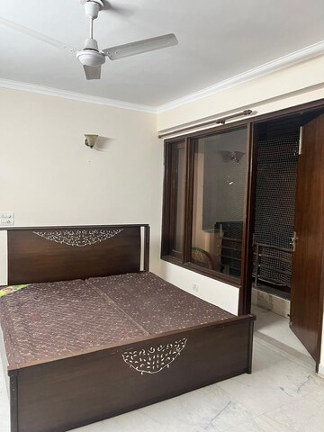Bedroom in 2 BHK Builder Floor at Palm Residency Chhatarpur, Chattarpur – for Rent