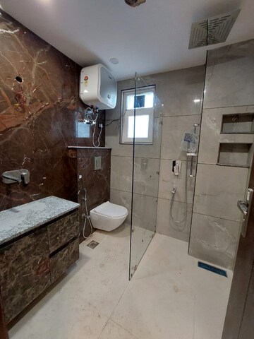 Bathroom in 3 BHK Builder Floor at South Extension ii – for Rent