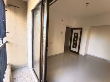 Building Lobby in 1 BHK Apartment at Rustomjee Global City – for Sale