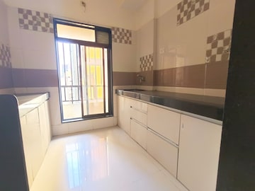 Kitchen in 1 BHK Apartment at Rustomjee Global City – for Sale