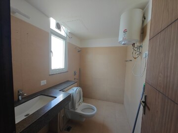 Bathroom in 3 BHK Apartment at Puri Emerald Bay, Sector 104 – for Rent