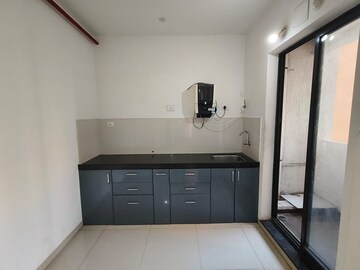 Kitchen in 2 BHK Apartment at Shapoorji Pallonji Joyville Hinjewadi Phase 2, Hinjewadi – for Rent