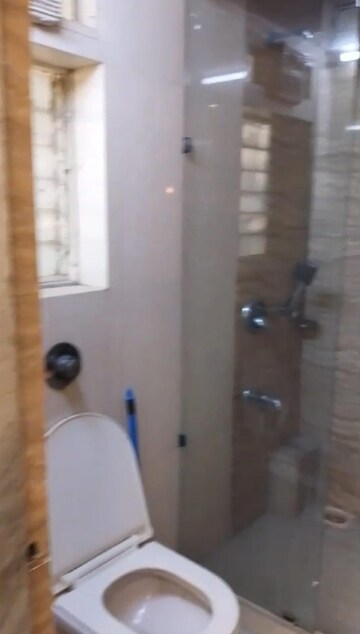 Bathroom in 2 BHK Apartment at Silver Sand CHS, Andheri West – for Rent