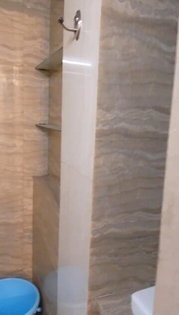 Bathroom in 2 BHK Apartment at Silver Sand CHS, Andheri West – for Rent