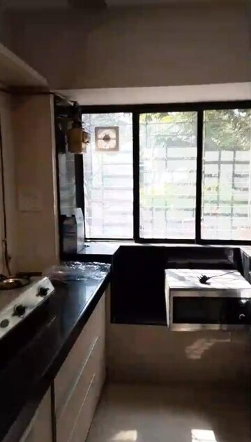 Kitchen in 2 BHK Apartment at Silver Sand CHS, Andheri West – for Rent