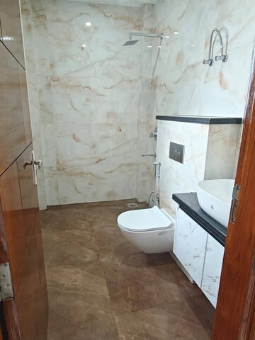 Bathroom in 3 BHK Builder Floor at Ansal API Esencia, Sector 67 – for Rent