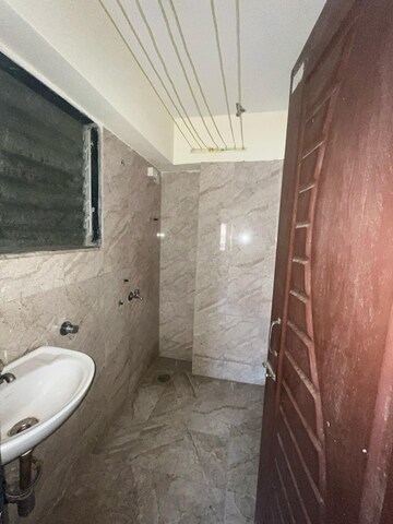 Bathroom in 1 BHK Apartment at Lodha Golden Dream, Dombivli East – for Rent