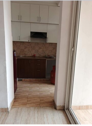 Kitchen in 2 BHK Apartment at Amrapali Golf Homes, Sector 4, Greater Noida – for Rent