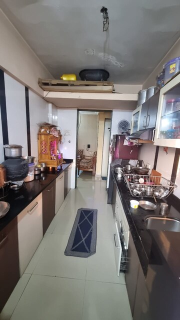 Kitchen in 2 BHK Apartment at Amrut Park CHS, Kalyan West – for Sale