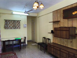 Living Room in 1 BHK Apartment at New Rajendra Apartment CHS, Mahim – for Rent