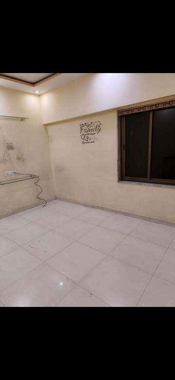 Room in 2 BHK Apartment at Amrut Park CHS, Kalyan West – for Sale