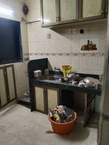 Kitchen in 2 BHK Apartment at Amrut Park CHS, Kalyan West – for Sale