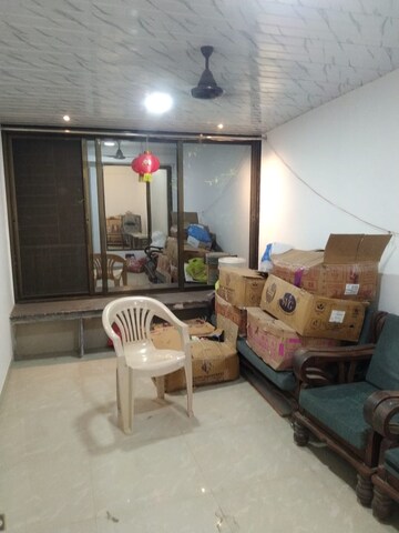Living Room in 2 BHK Apartment at Amrut Park CHS, Kalyan West – for Sale