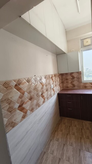 Kitchen in 2 BHK Apartment at Supertech Cape Town, Sector 74 – for Rent