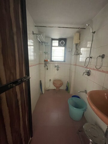 Bathroom in 2 BHK Apartment at Satellite Garden, Umershetpada – for Sale