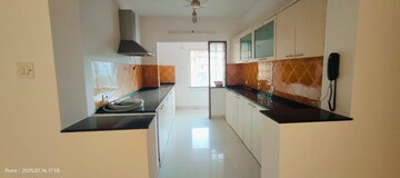 Kitchen in 3 BHK Apartment at Marigold Complex, Kalyani Nagar – for Rent