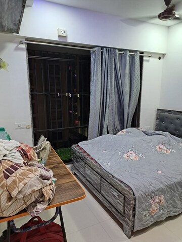 Bedroom in 1 BHK Builder Floor at Parinee Essence, Kandivali West – for Sale