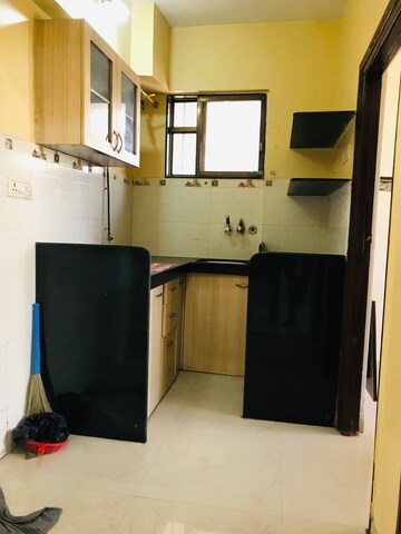 Kitchen in 1.5 BHK Apartment at Vrishi Complex, Kandarpada – for Rent