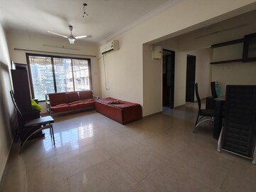 Living Room in 2 BHK Apartment at Riddhi Garden, Malad East – for Rent