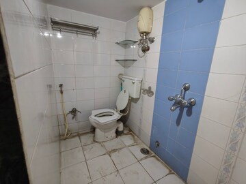 Bathroom in 2 BHK Apartment at Riddhi Garden, Malad East – for Rent