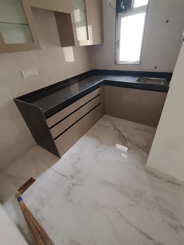 Kitchen in 2 BHK Apartment at New Mhada Complex, Mira Road – for Sale