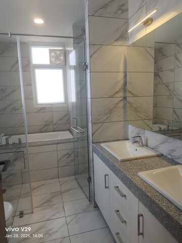 Bathroom in 3 BHK Apartment at Tata Raheja Raisina Residency, Sector 59 – for Sale