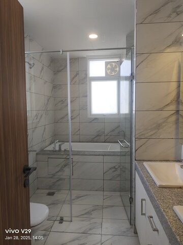 Bathroom in 3 BHK Apartment at Tata Raheja Raisina Residency, Sector 59 – for Sale