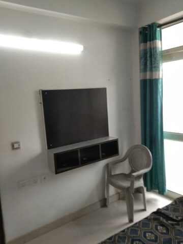 Living Room in 2 BHK Apartment at Charms Castle, Raj Nagar Extension – for Rent