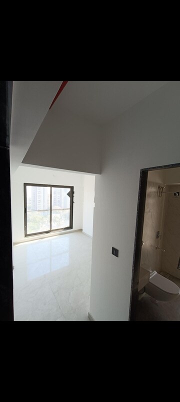 Building Lobby in 2 BHK Apartment at Omkar Signet, Malad East – for Rent