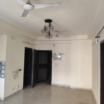 Living Room in 2.5 BHK Apartment at Aims Golf Avenue I, Sector 75 – for Rent