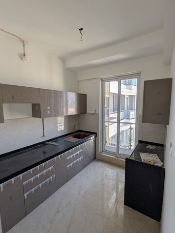 Kitchen in 2 BHK Apartment at Rosa Manhattan, Ghodbunder Road – for Sale