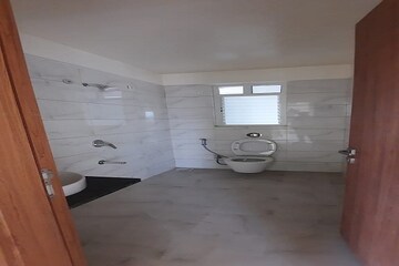 Bathroom in Studio Apartment at Apex Park Square, Sector 16b Greater Noida – for Sale