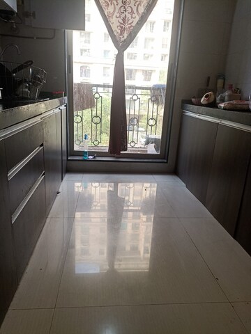 Kitchen in 1 BHK Apartment at Puranik City Reserva, Ghodbunder – for Rent