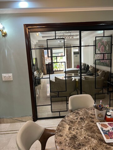 Living Room in 3 BHK Apartment at Kailash Colony – for Sale