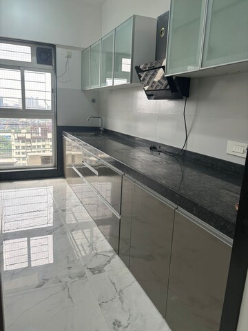 Kitchen in 3 BHK Apartment at K Raheja Heights, Malad East – for Rent