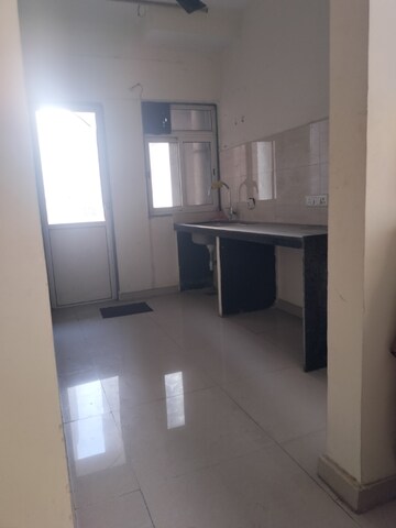 Kitchen in 1.5 BHK Apartment at Indiabulls Greens, New Panvel – for Rent