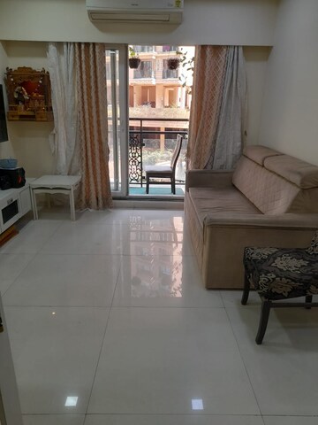 Living Room in 1 BHK Apartment at JK Iris, Mira Road – for Sale