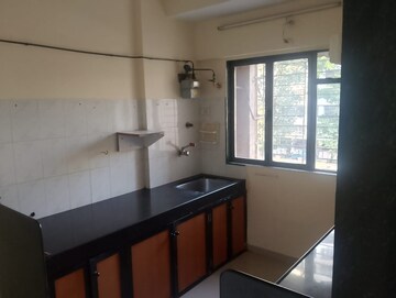 Kitchen in 2 BHK Apartment at Acme Complex 2A, Goregaon West – for Rent