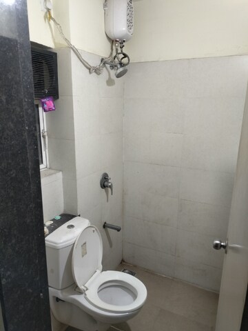 Bathroom in 2 BHK Apartment at Indiabulls Greens, New Panvel – for Rent
